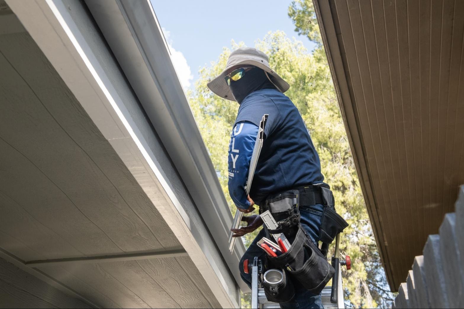 Working the gutter line under the eave