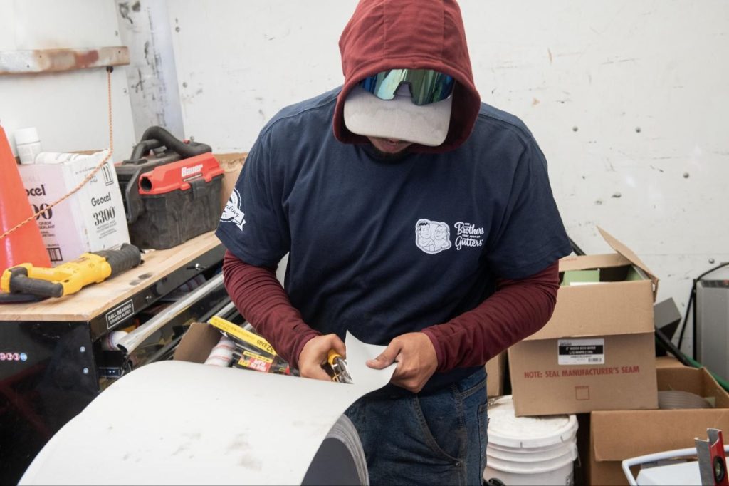 Trimming coil stock inside the gutter truck