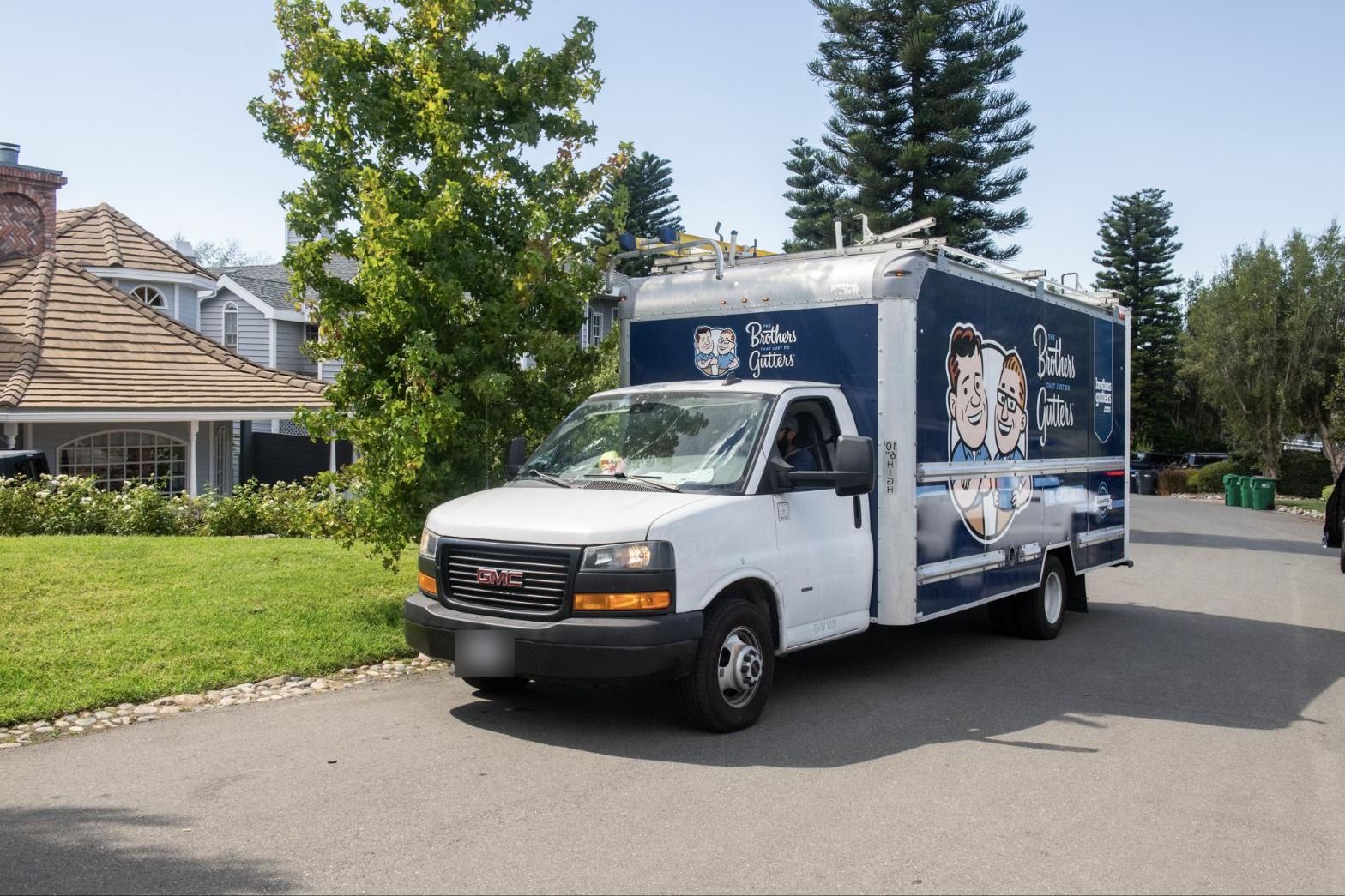 The gutter truck pulling up to a North OC job